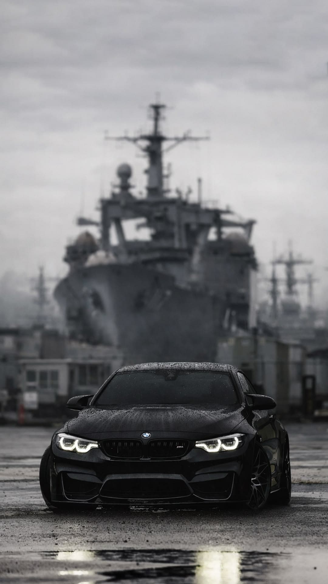 Black BMW M4 Sports Car Military Harbor Background