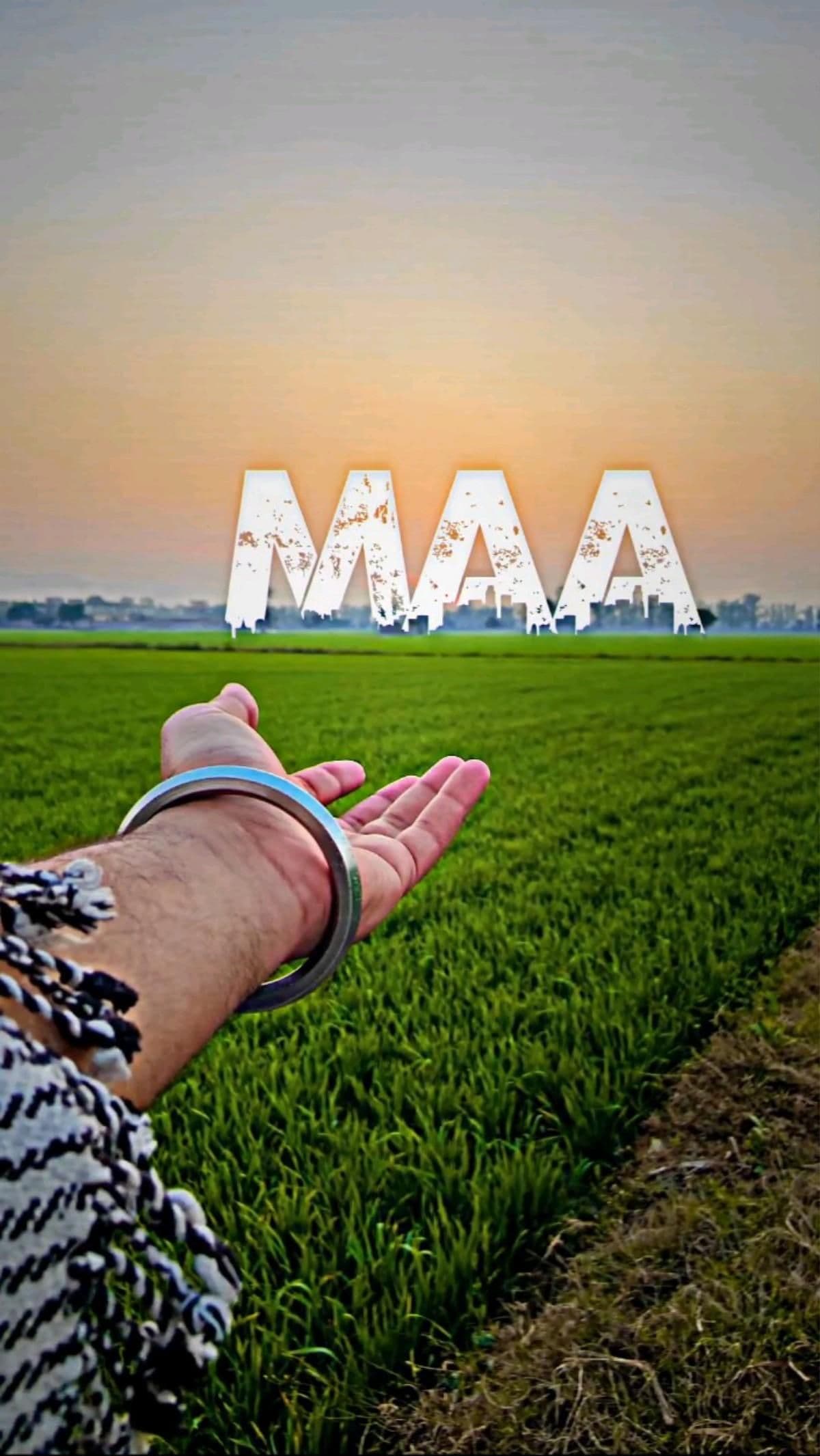 Maa Text Above Green Field