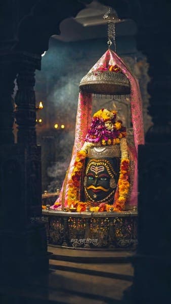 Sacred Shiva Linga Temple Shrine with Flowers