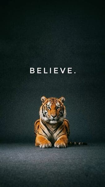 Tiger Sitting with Believe Text
